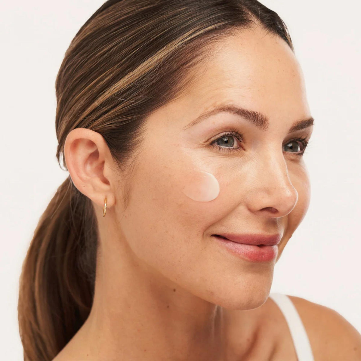 ALASTIN Skincare C-RADICAL Defense Antioxidant Serum shown on model