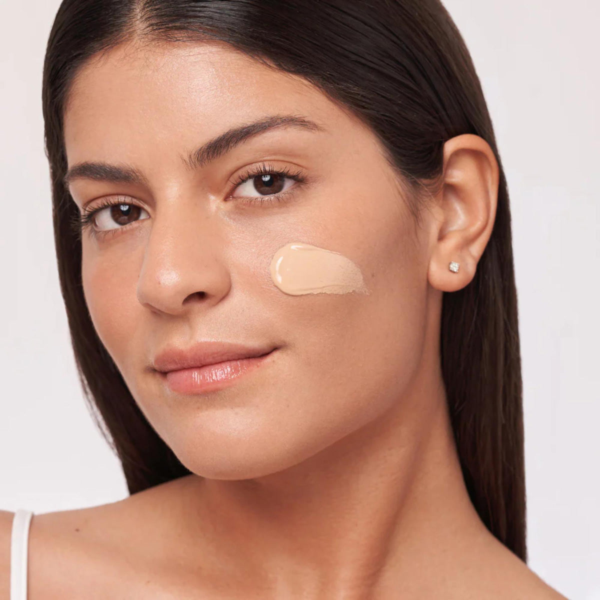 ALASTIN Skincare HydraTint Pro Mineral Broad Spectrum Sunscreen SPF 36 shown on model