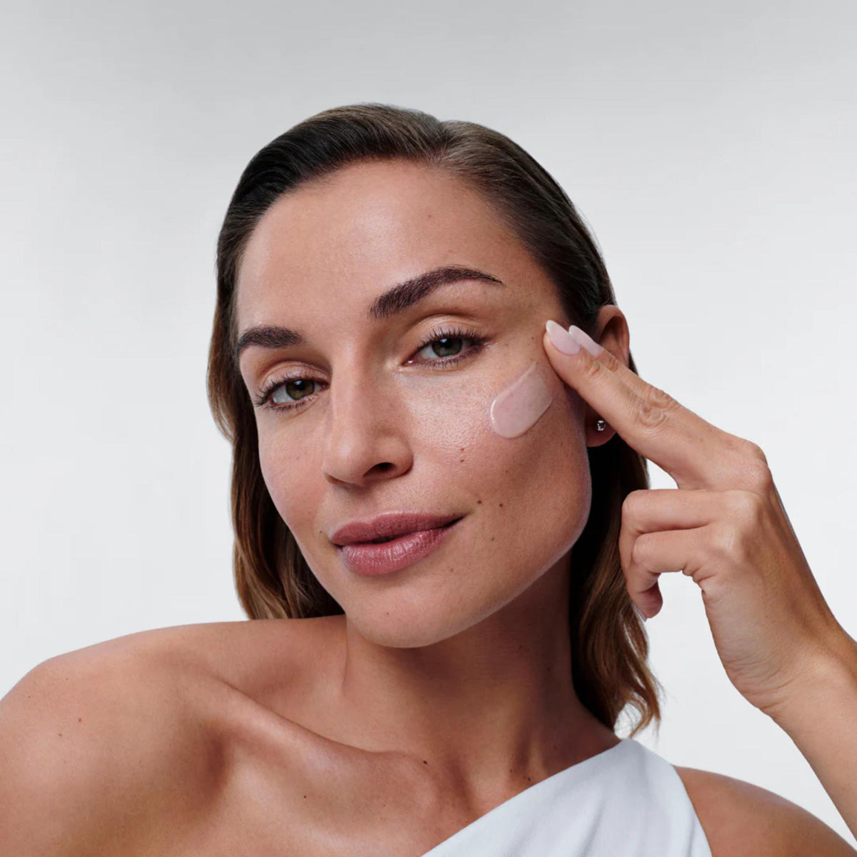 ALASTIN Skincare Restorative Skin Complex with TriHex shown on model
